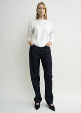 Twisted seam denim full length rinsed blue