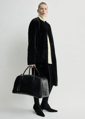 Croco-embossed traveler black
