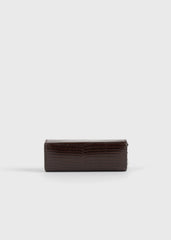 Lizard-embossed lipstick case brown