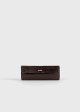 Lizard-embossed lipstick case brown