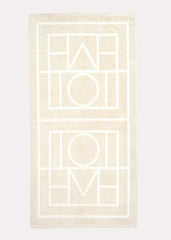Monogram jacquard beach towel sand