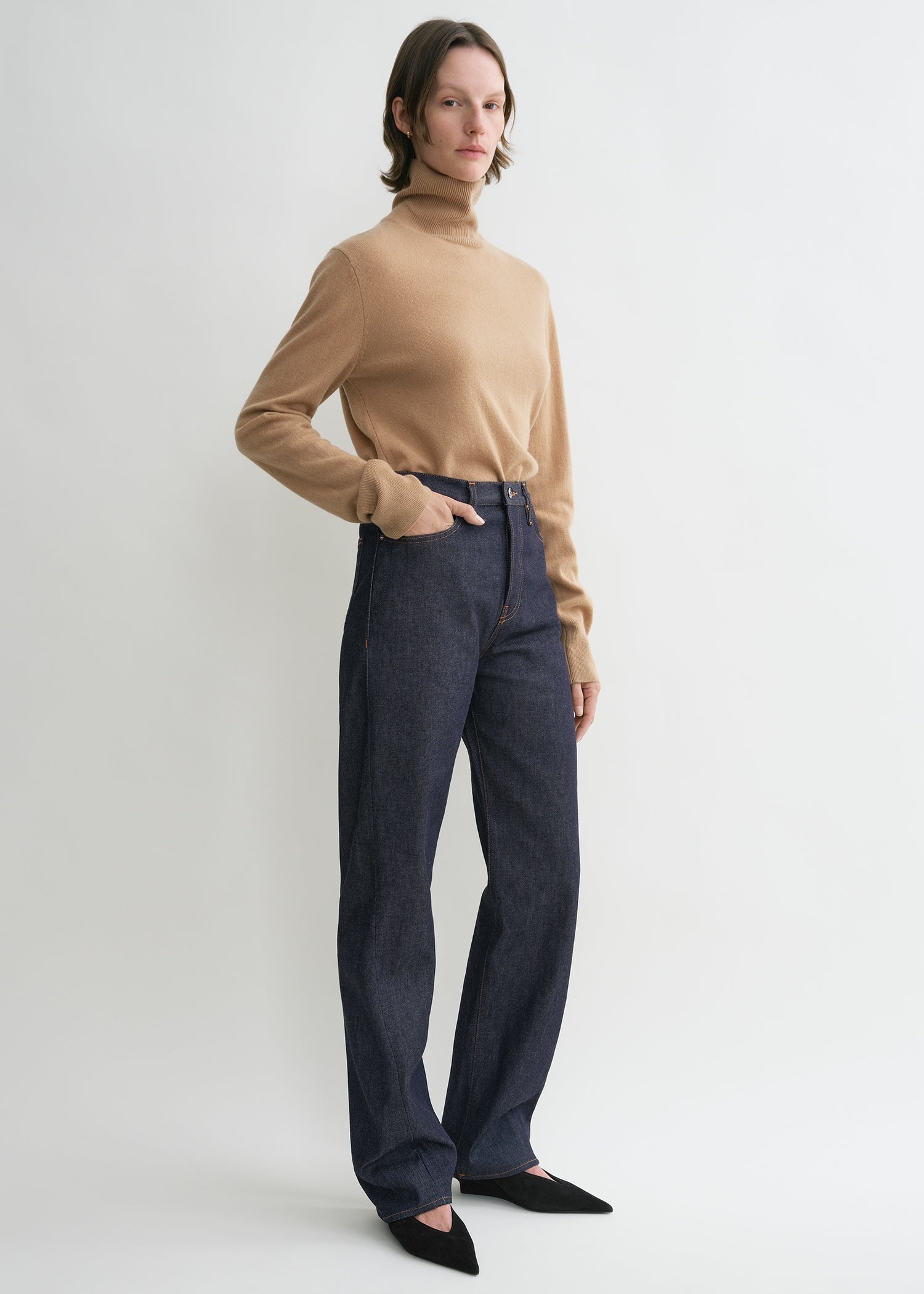 Twisted seam denim full length raw blue