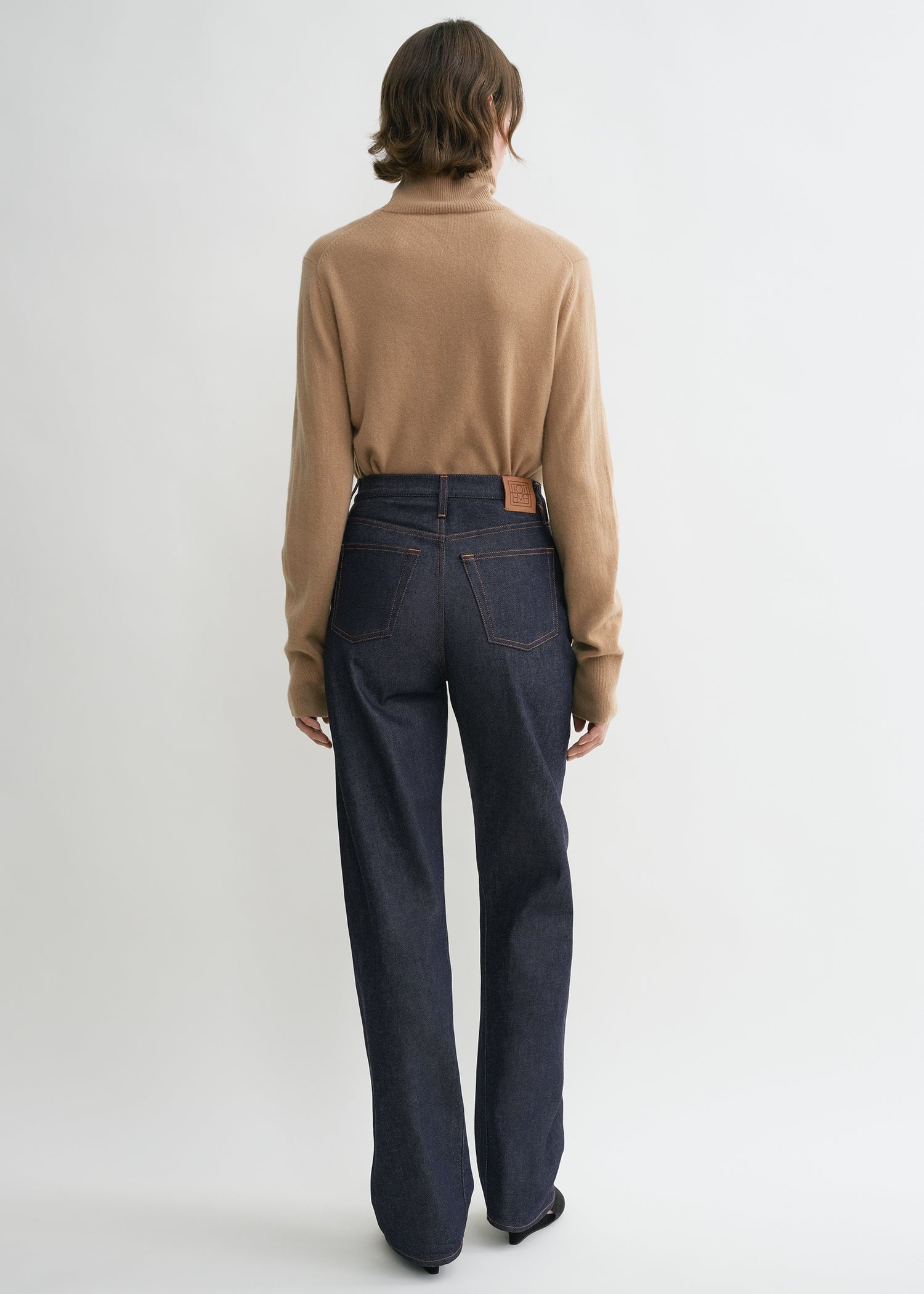 Twisted seam denim full length raw blue