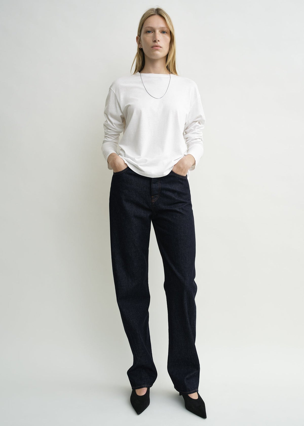 Twisted seam denim full length rinsed blue