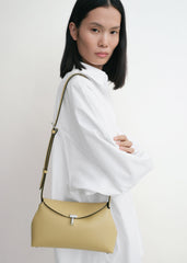 T-lock grained-leather clutch desert