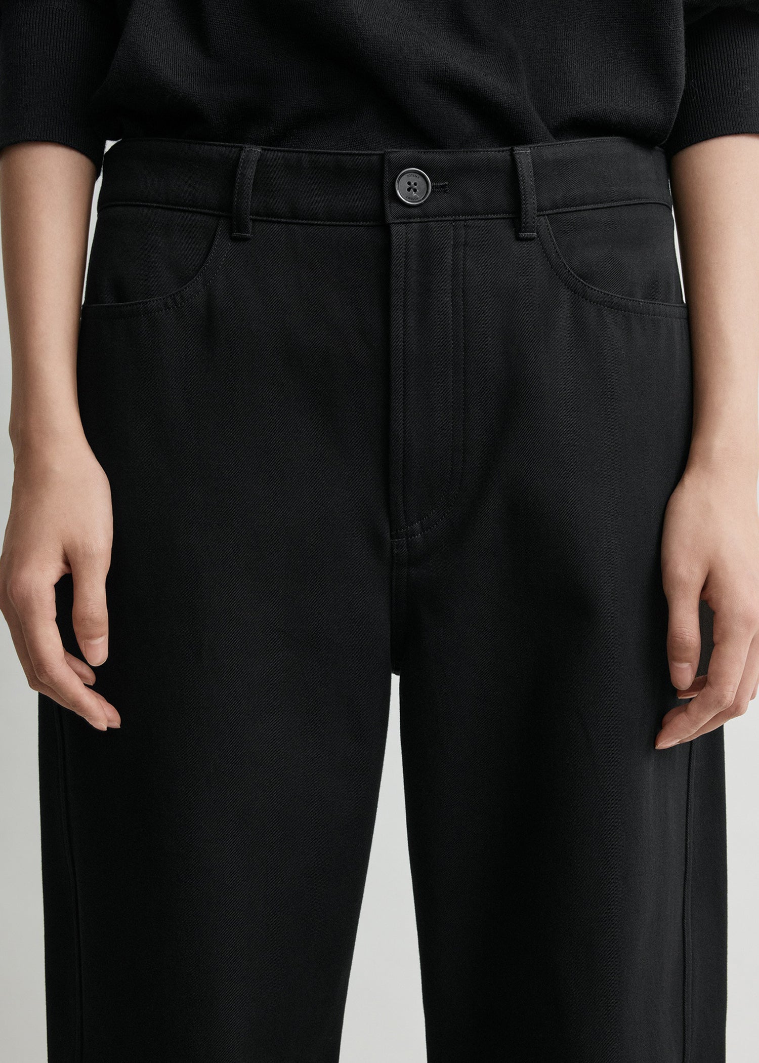 Relaxed twisted trousers black petite