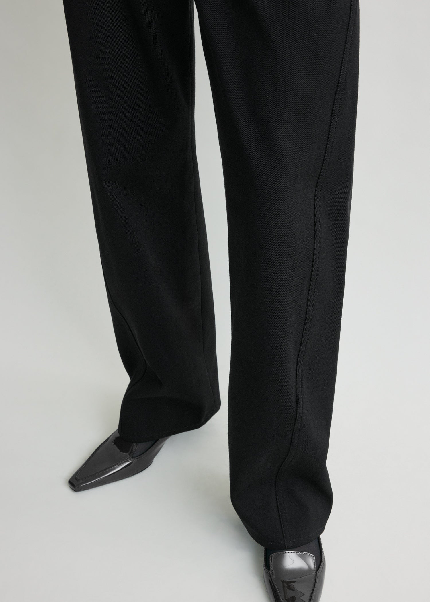 Relaxed twisted trousers black petite