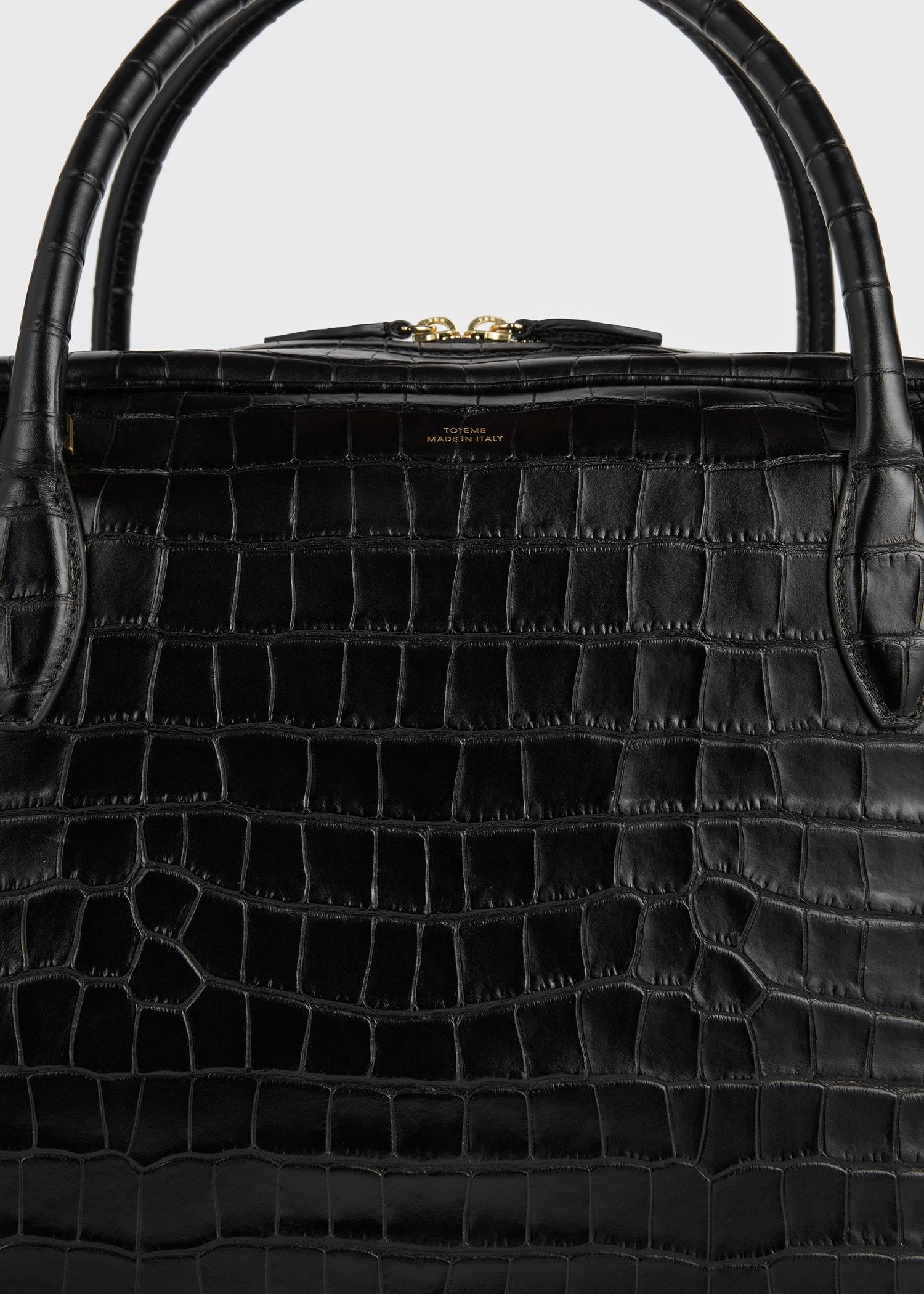 Croco-embossed traveler black