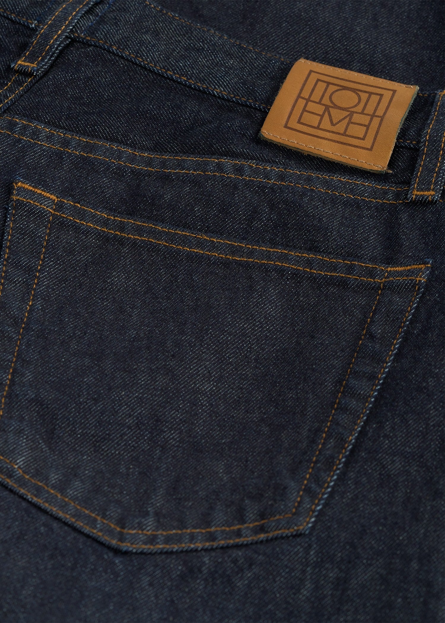 Twisted seam denim full length rinsed blue