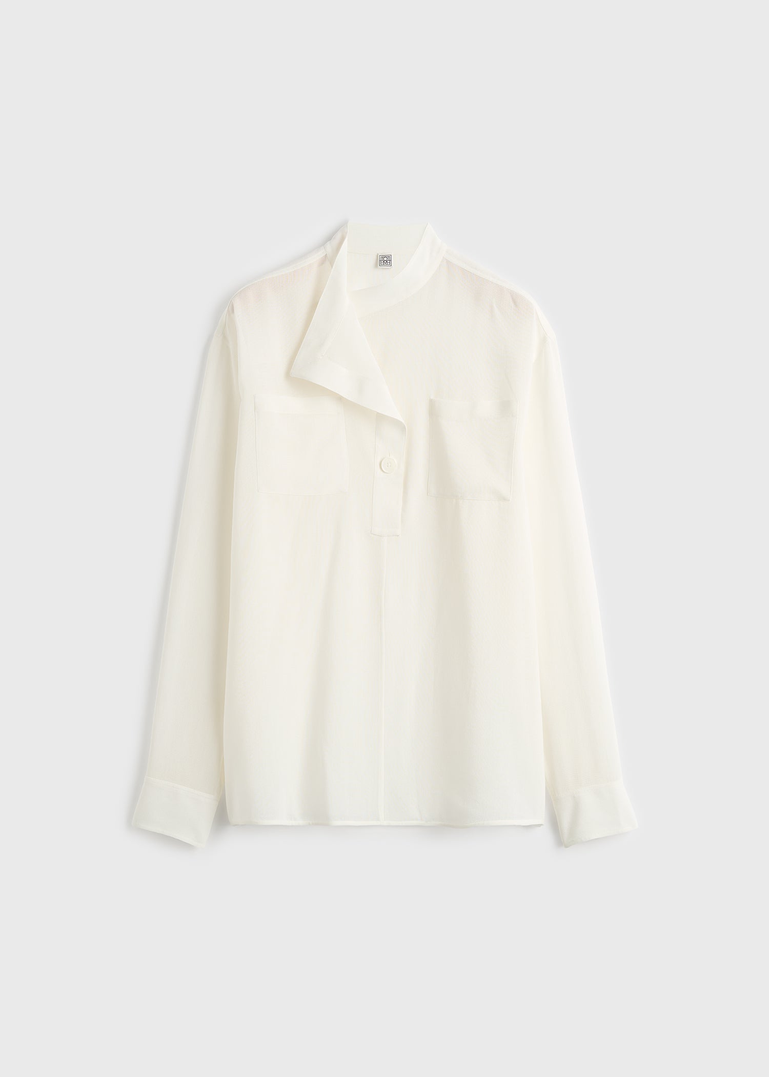 Overlapping collar blouse milk