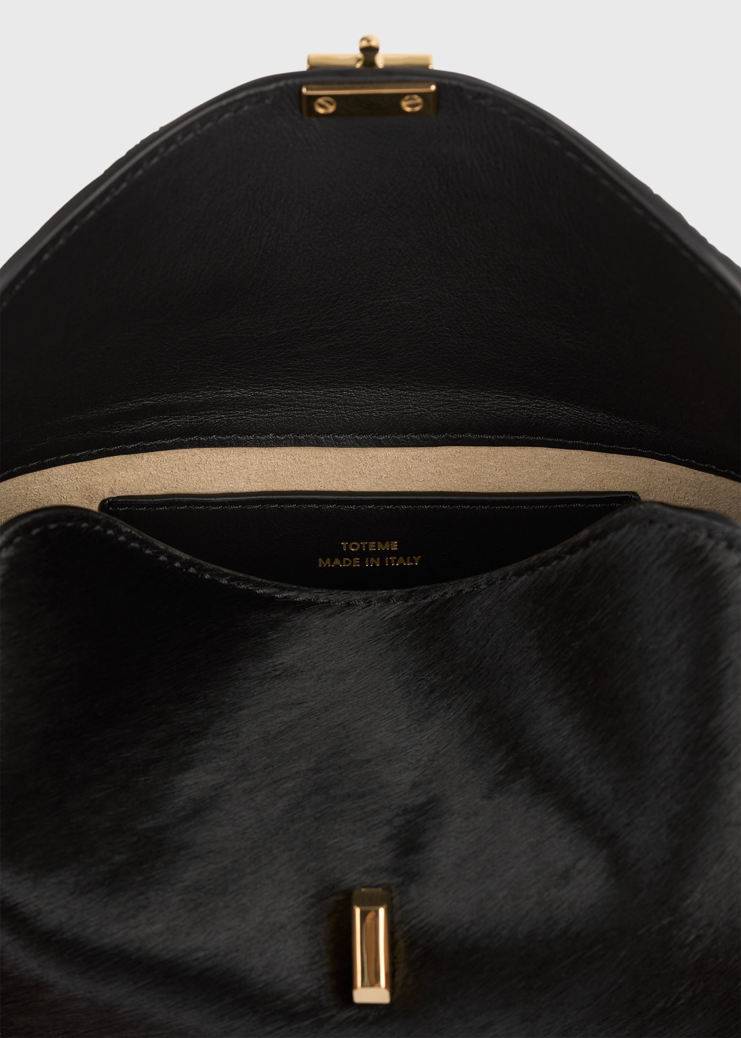 Mini T-lock pony hair clutch black